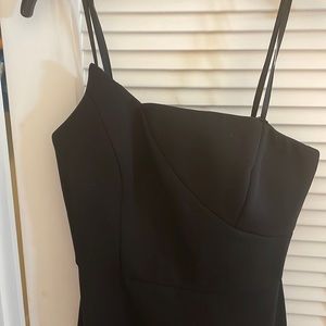 BCBG all black gown, with a split right above left knee. Complete strapless 8.